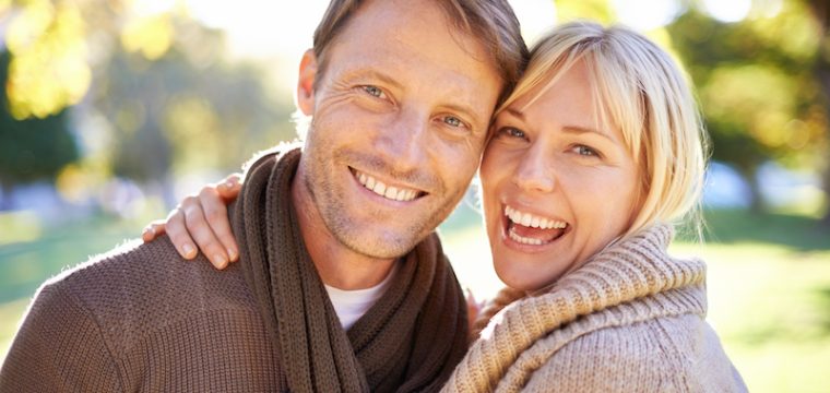 Portrait of an attractive young couple at the park.